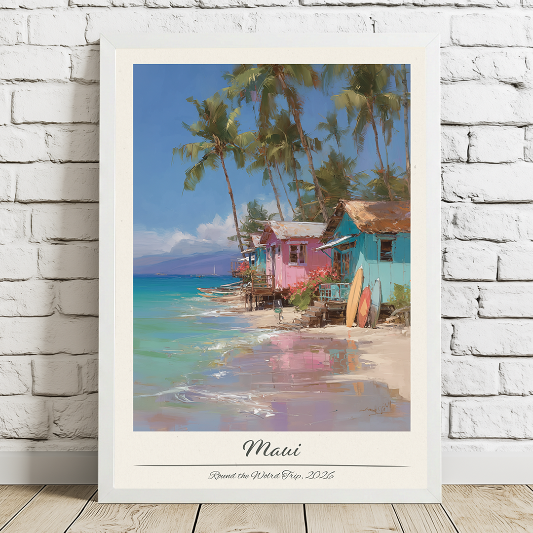 Framed artwork of a tropical beach scene with colorful houses and palm trees.