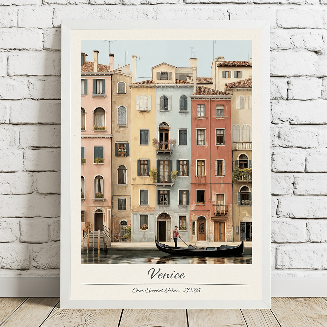 Framed artwork of a gondola scene in Venice on a white brick wall.