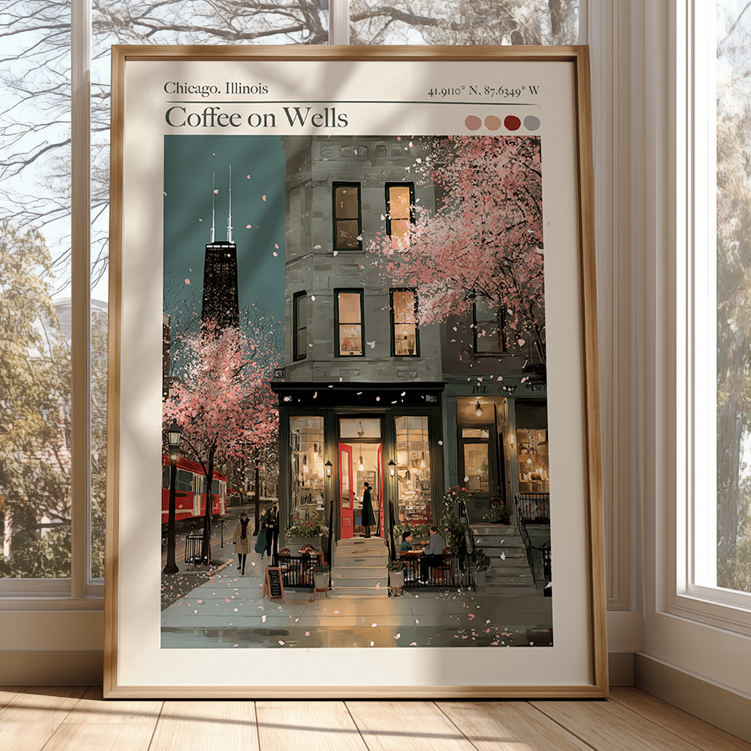 Framed artwork of a city street scene with cherry blossoms and a building, displayed in a room with large windows.