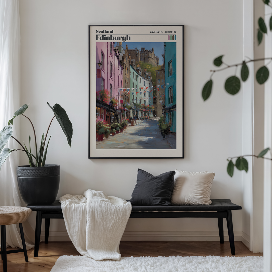 Framed artwork of Edinburgh on a wall above a bench with cushions.