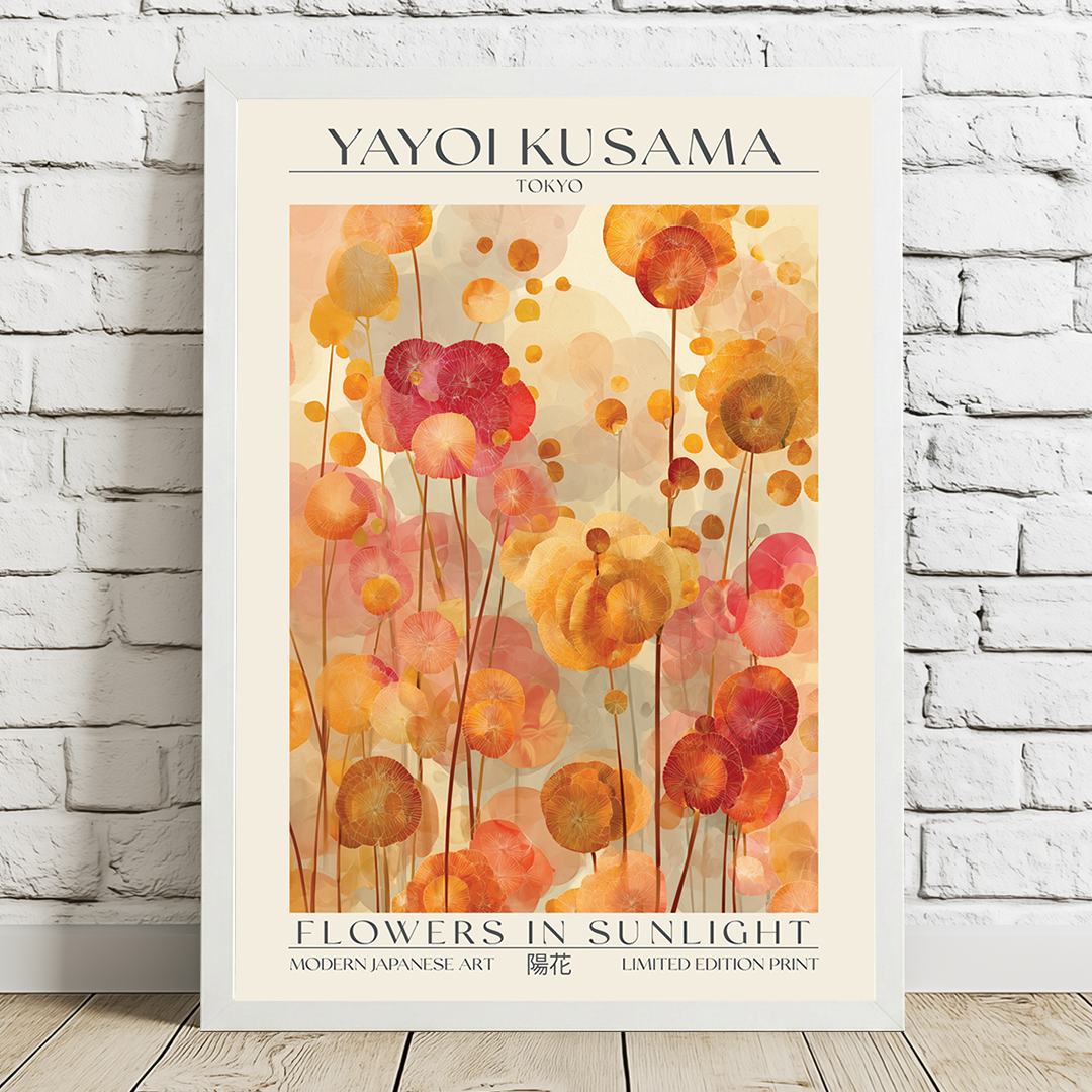 Framed artwork by Yayoi Kusama featuring abstract floral design on a white brick wall.