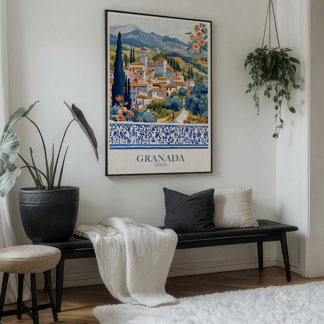 Framed artwork of Granada, Spain with scenic village and mountains in a odern white living room