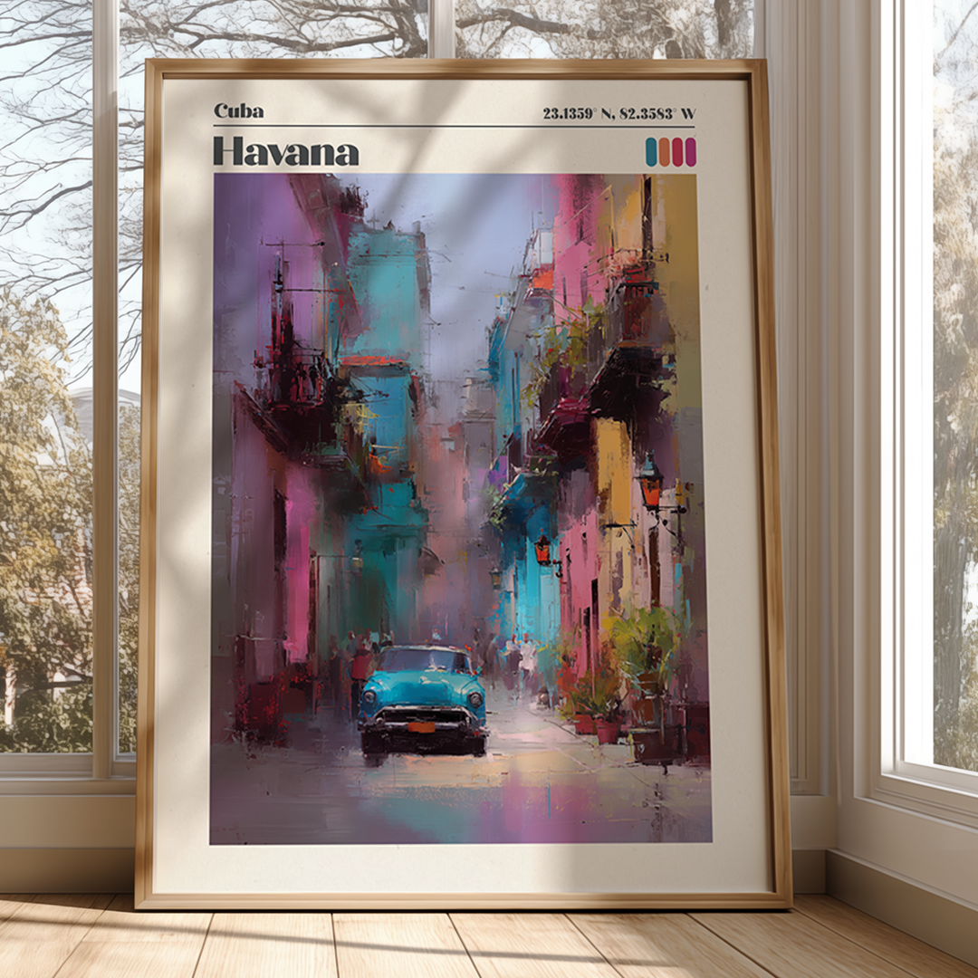 Framed artwork of a colorful street scene in Havana, Cuba, with a vintage car.
