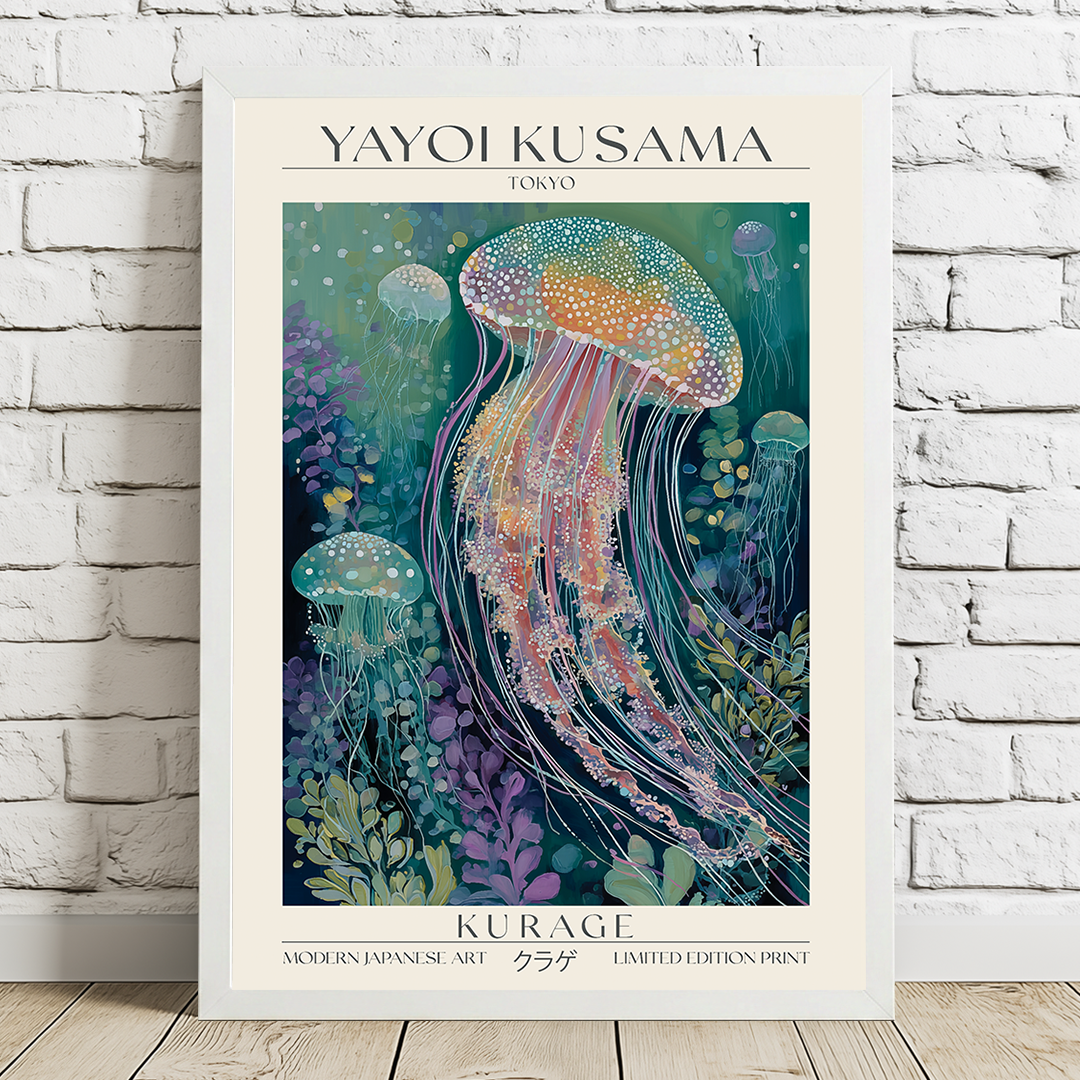 Framed artwork of a colorful jellyfish by Yayoi Kusama on a white brick wall.