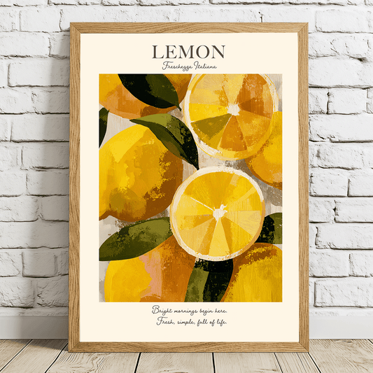 A framed art print featuring a watercolor illustration of lemons, leaning against a white brick wall on a light wood floor. The print has a cream background with the word 'LEMON' at the top and a quote at the bottom, enclosed in a light oak frame.