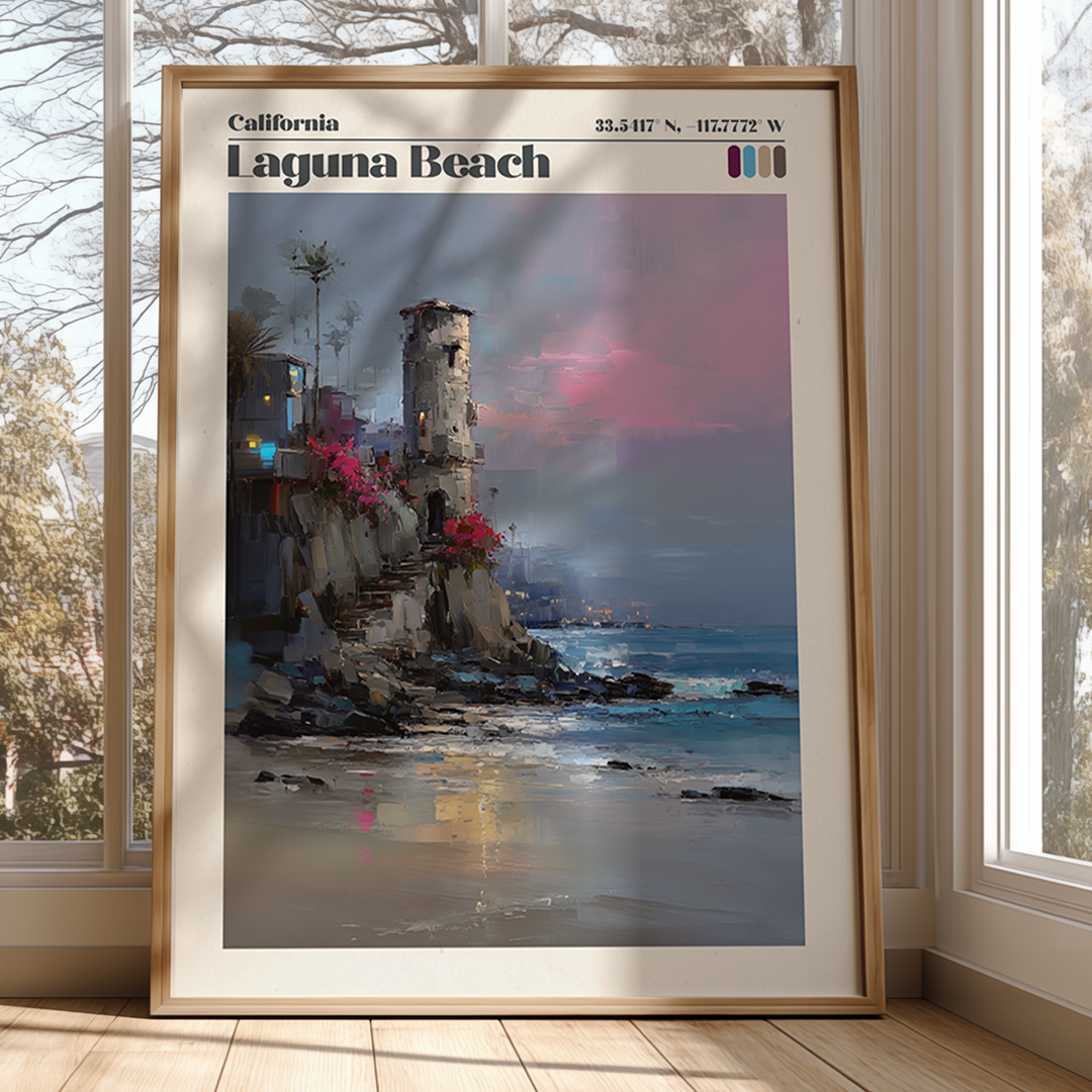 Framed artwork of a coastal scene with a sunset over the ocean, displayed in a room with large windows.