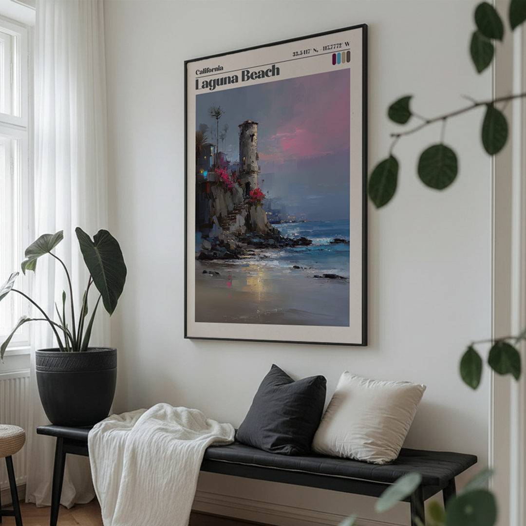 Framed artwork of a coastal scene in a living room with a bench and plants.