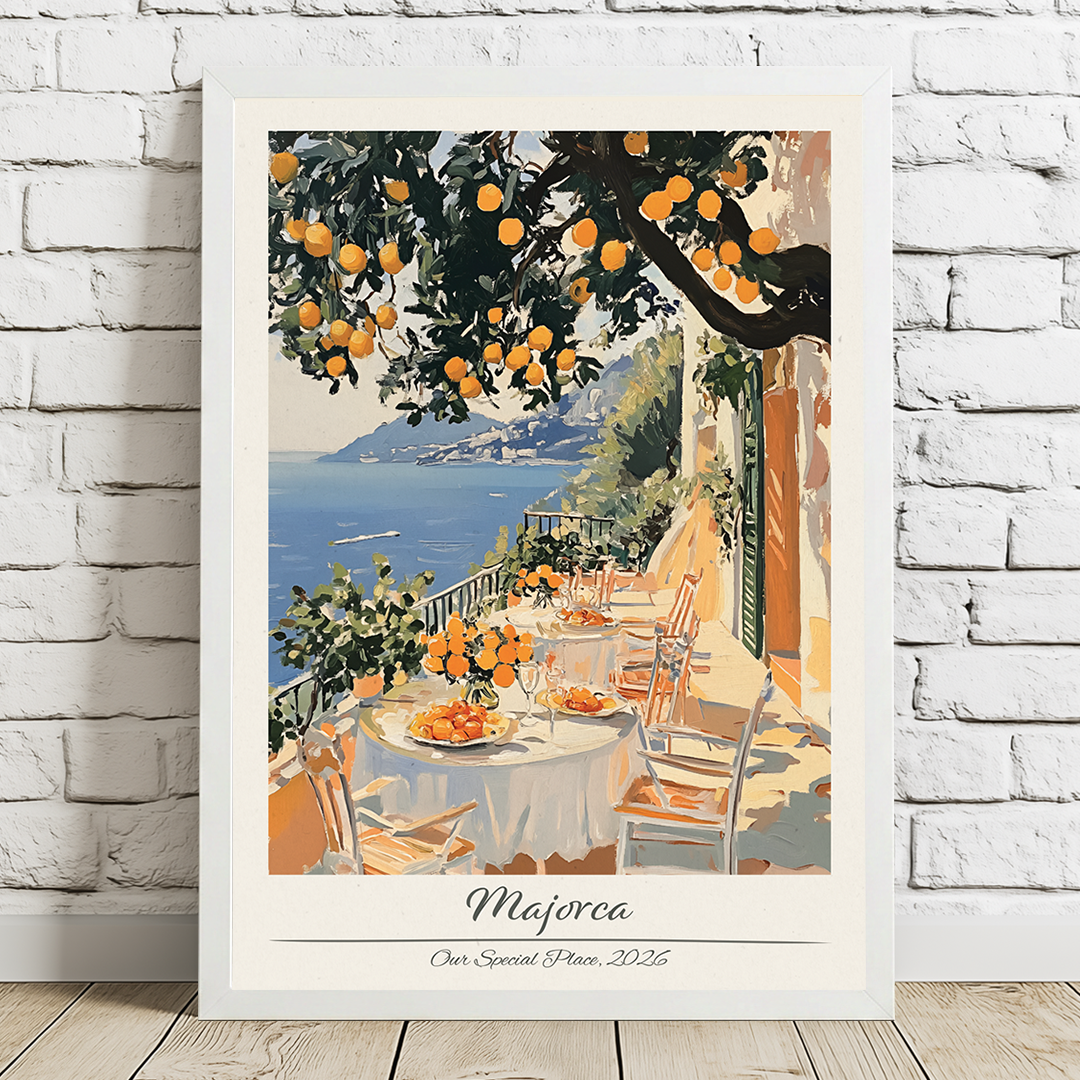 Framed artwork of a scenic outdoor setting with tables and orange trees, labeled 'Majorca'.