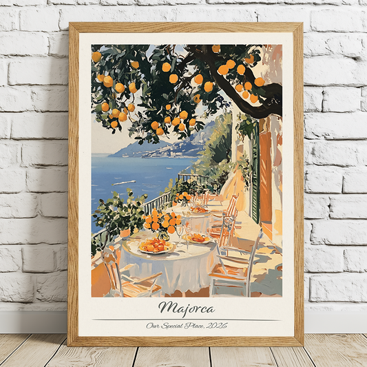 Framed artwork of a scenic outdoor setting with tables and oranges, titled 'Majorca'.