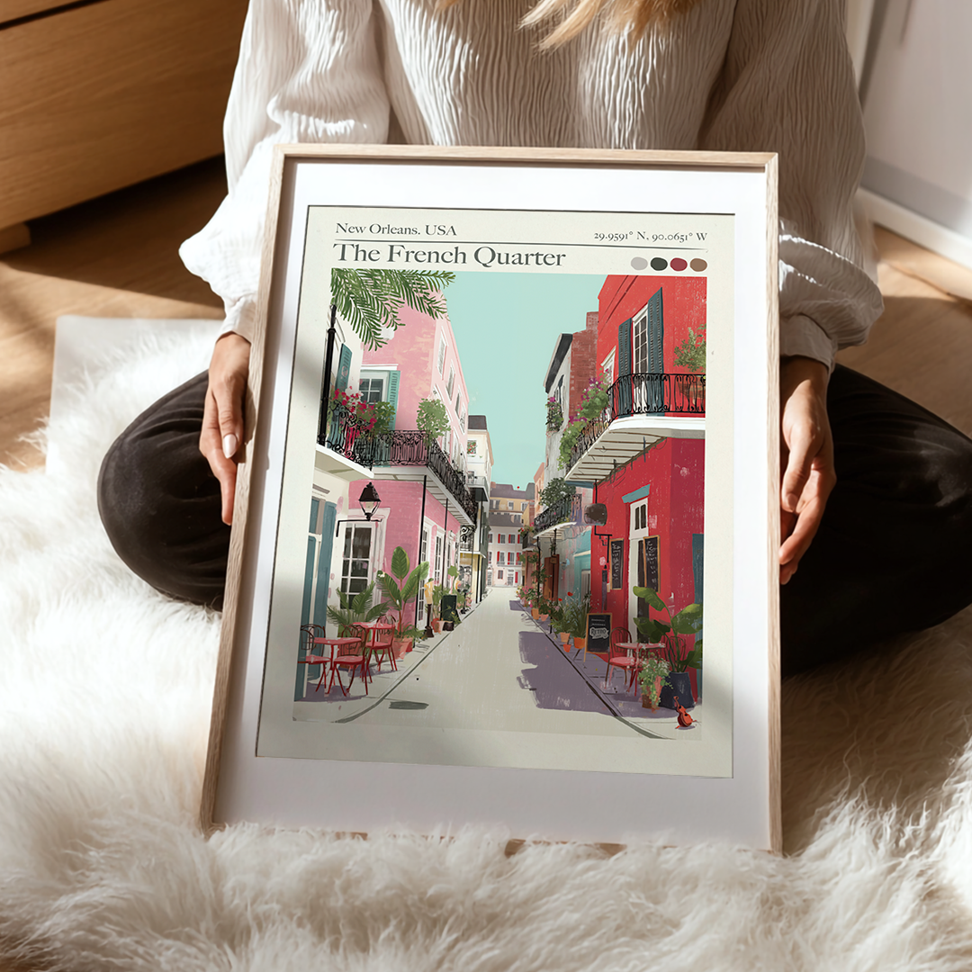 Person holding a framed print of 'The French Quarter' in New Orleans, USA.