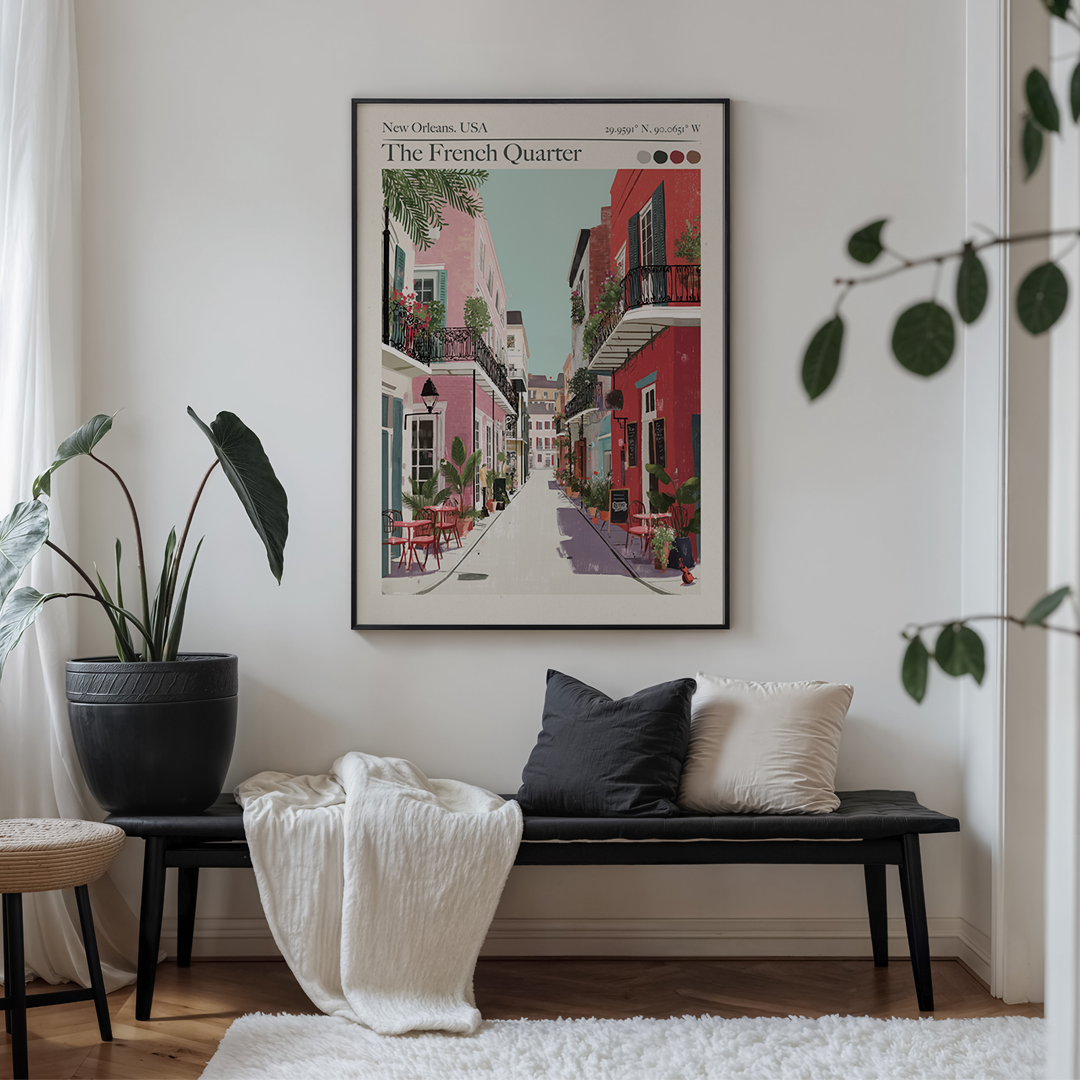 Living room with a bench, plant, and framed artwork of New Orleans.