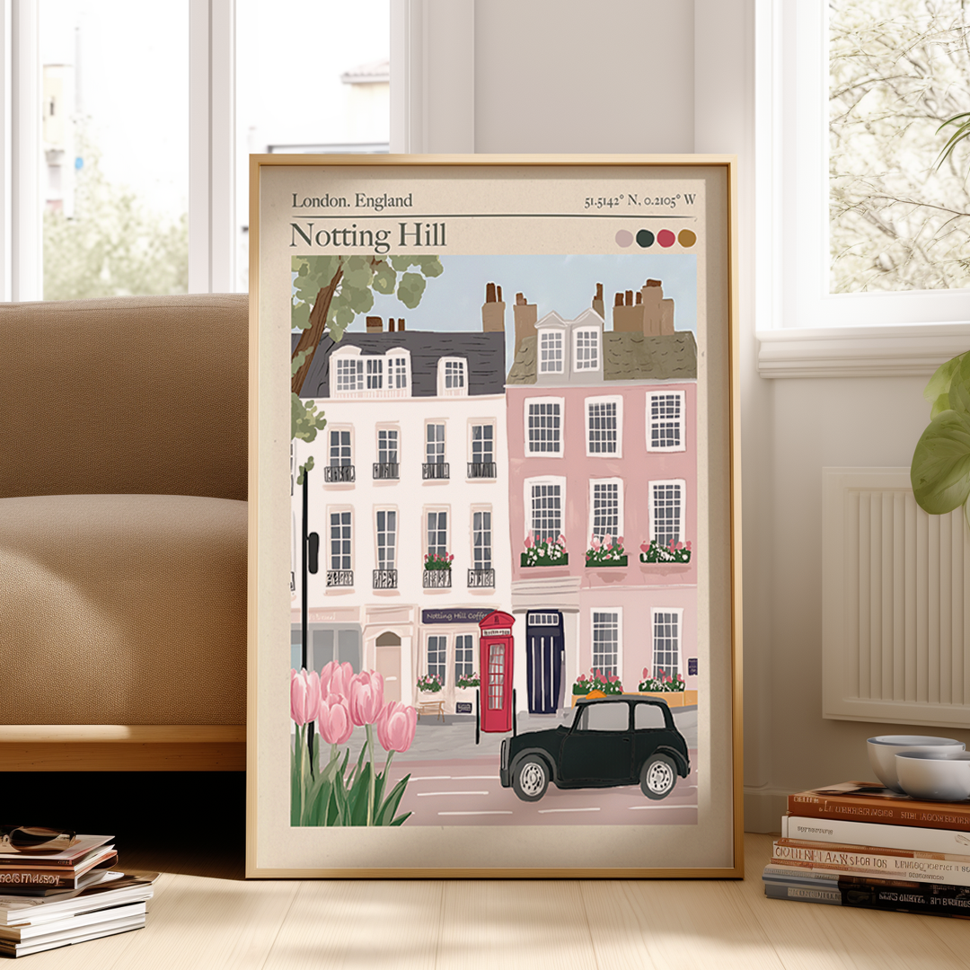 Framed artwork of a London street scene with houses, a black car, and a red phone box.