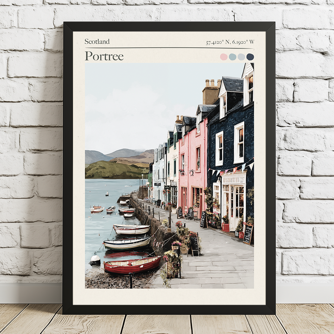 Framed artwork of a coastal scene with colorful houses and boats in Portree, Scotland.