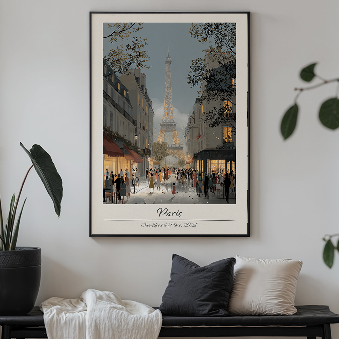 Framed artwork of Paris with Eiffel Tower on a wall above a sofa.