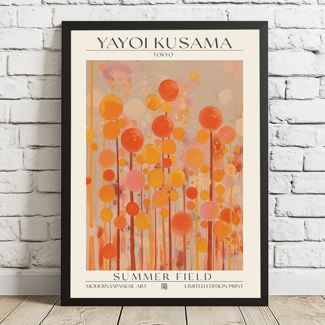 Framed Yayoi Kusama art print titled 'Summer Field' on a white brick wall.