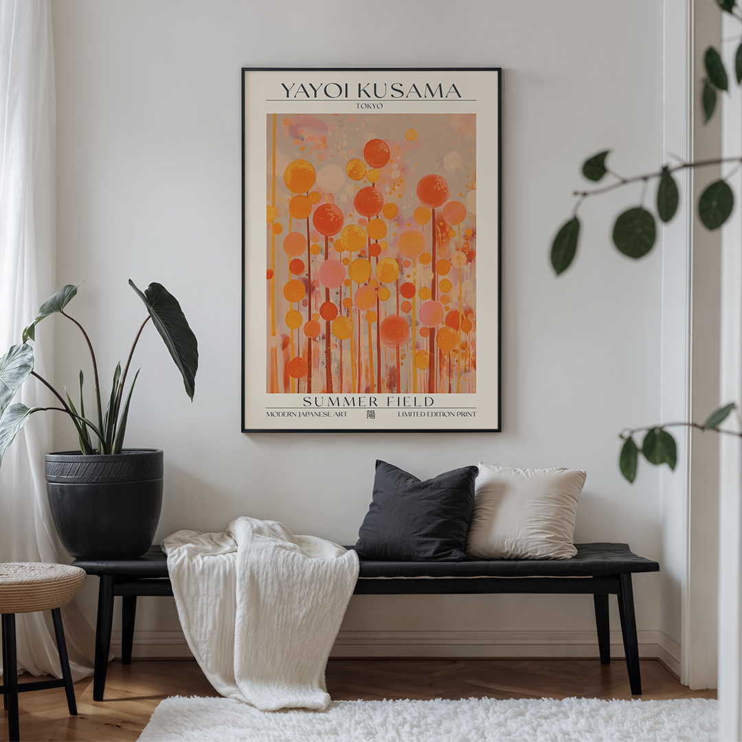 Living room with a bench, plant, and Yayoi Kusama art print on the wall.
