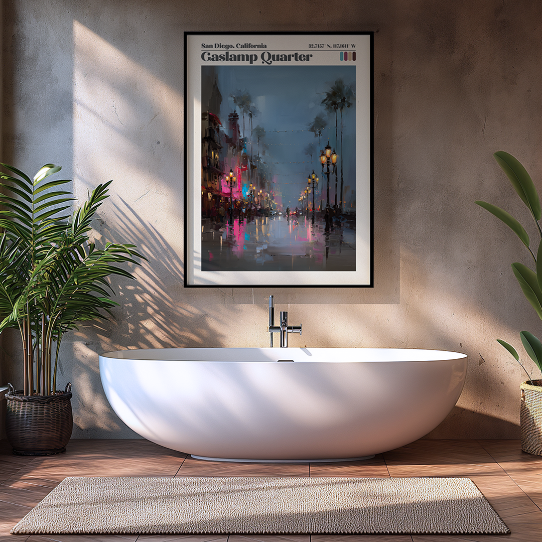 Modern bathroom with a white freestanding bathtub, framed artwork on the wall, and plants.