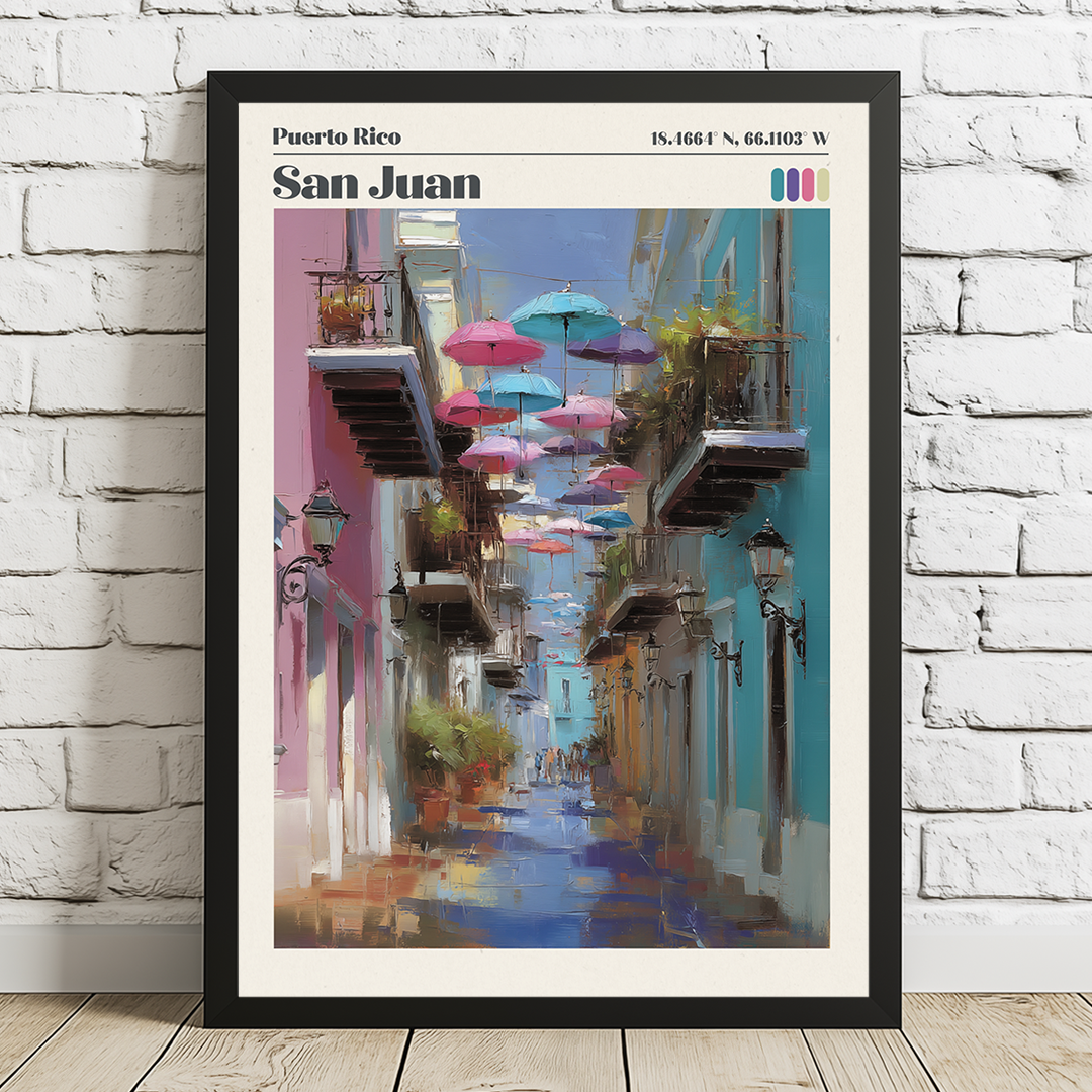 Framed artwork of a colorful street scene in San Juan, Puerto Rico, with umbrellas and buildings.