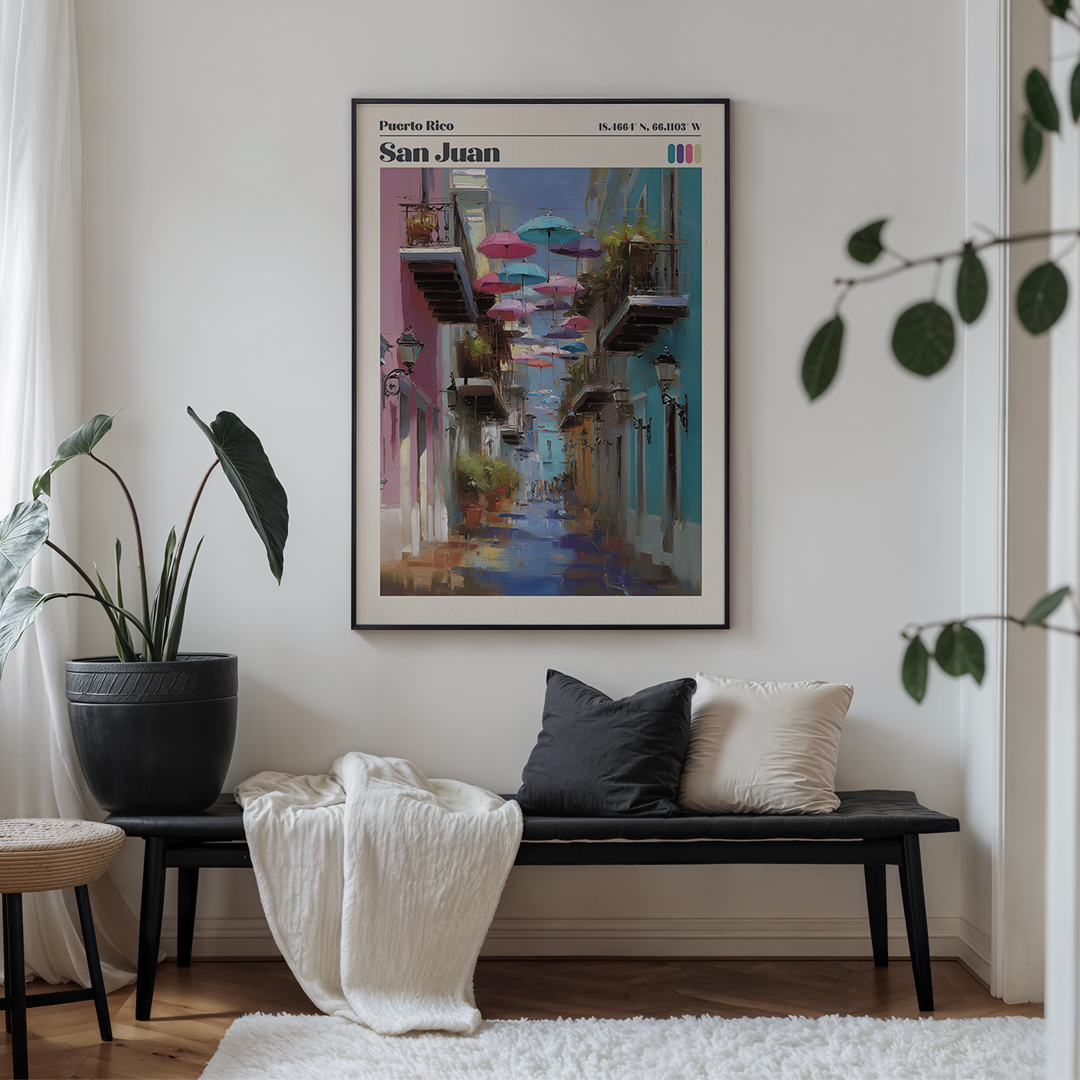 Living room with a colorful painting of a street scene on the wall above a bench.