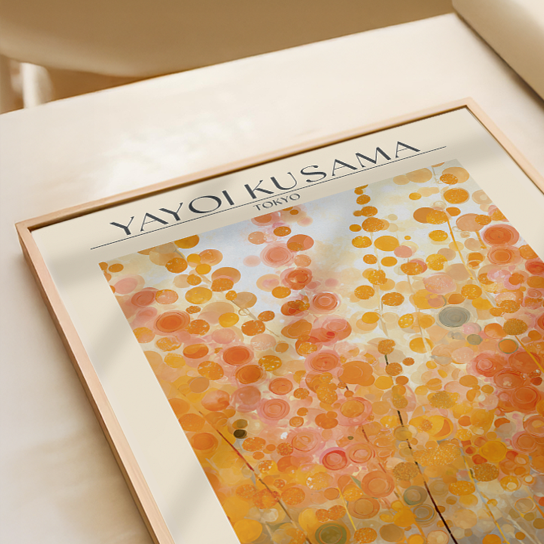 Framed Yayoi Kusama art print titled 'Sunspots' on a white brick wall