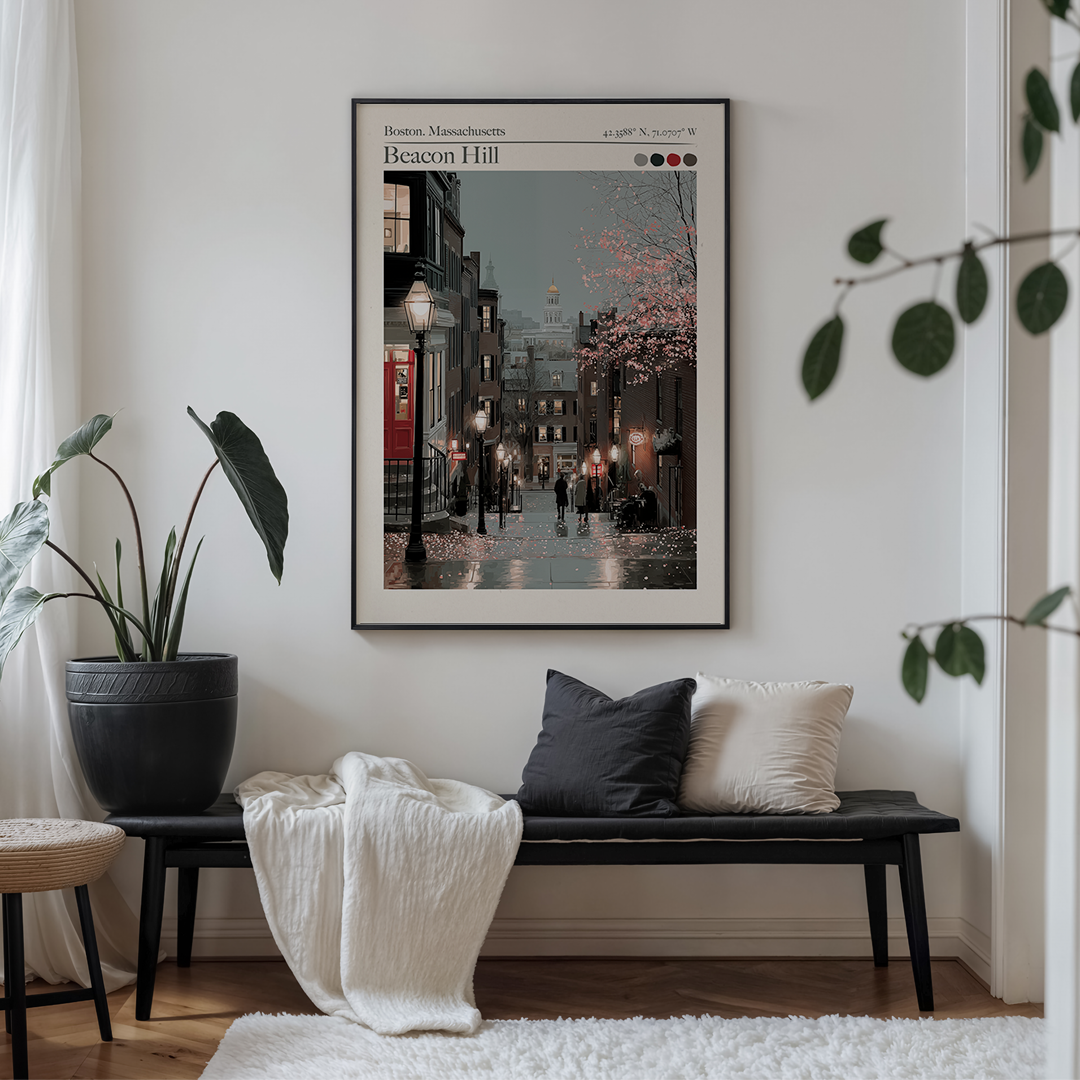 Living room with a framed poster of Beacon Hill, Boston, on the wall above a bench.