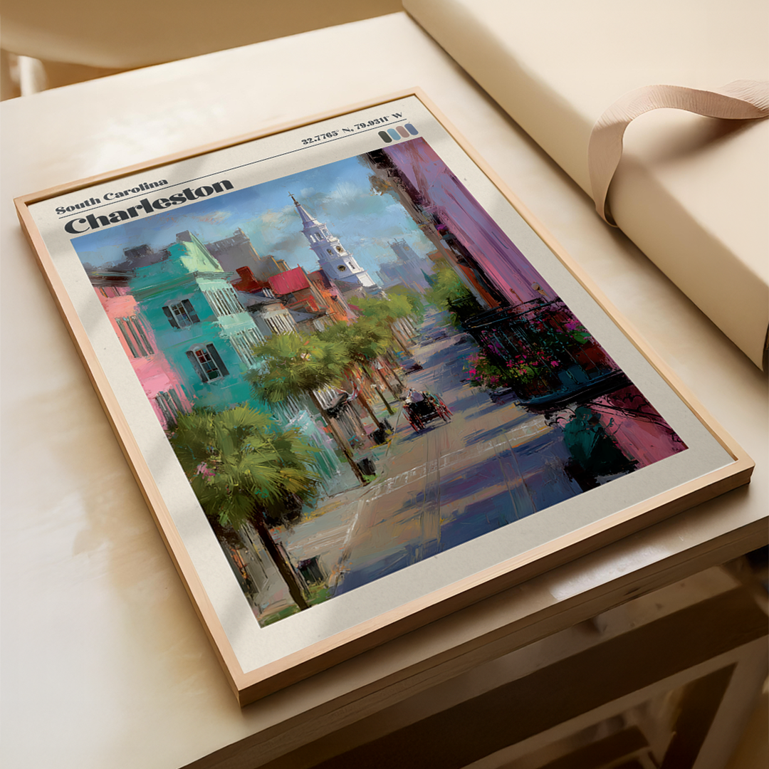 Framed artwork of a cityscape with colorful buildings on a wooden surface.