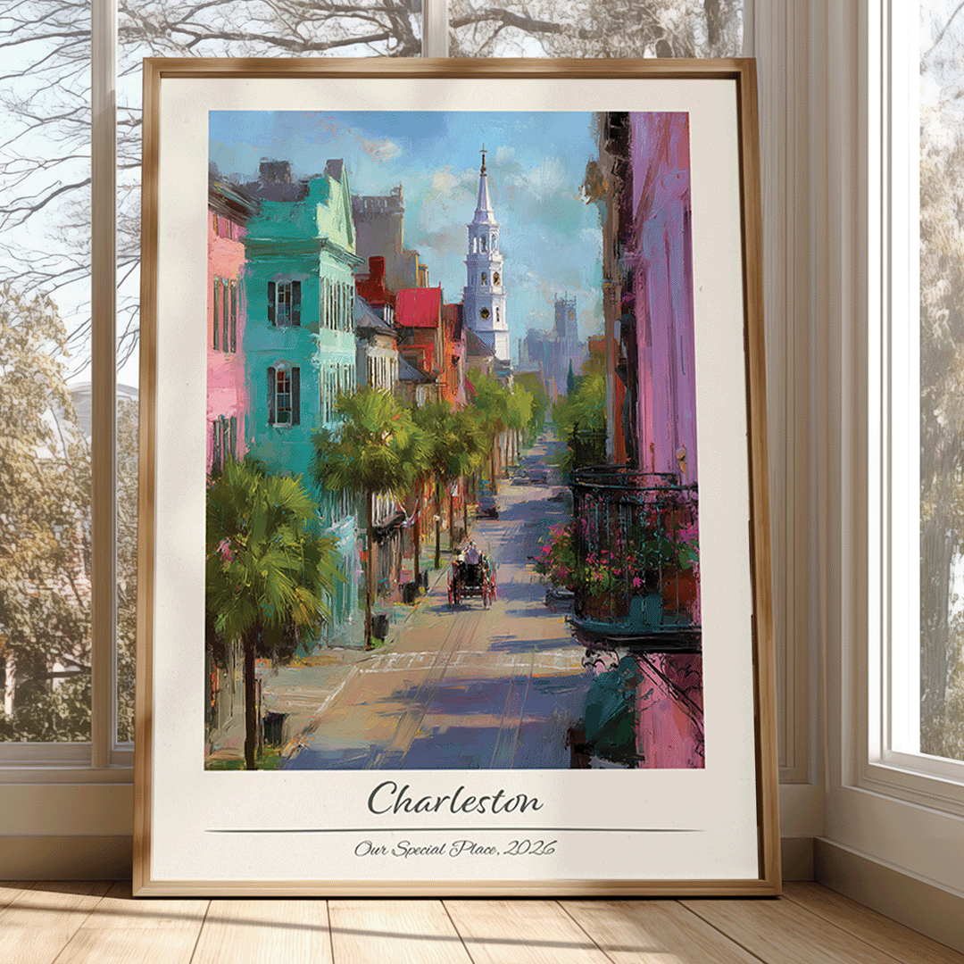 Framed artwork of a colorful street scene in Charleston, displayed in a room with large windows.