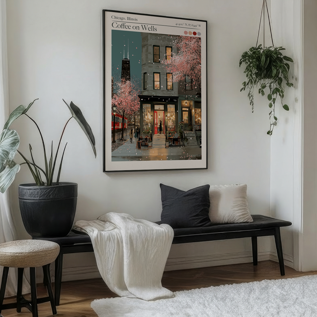 Living room with a black bench, decorative pillows, and a framed picture on the wall.