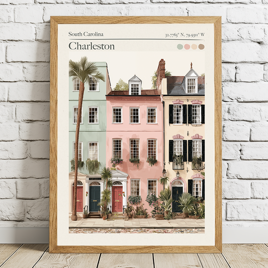 Framed artwork of Charleston with colorful houses and palm trees on a white brick wall.