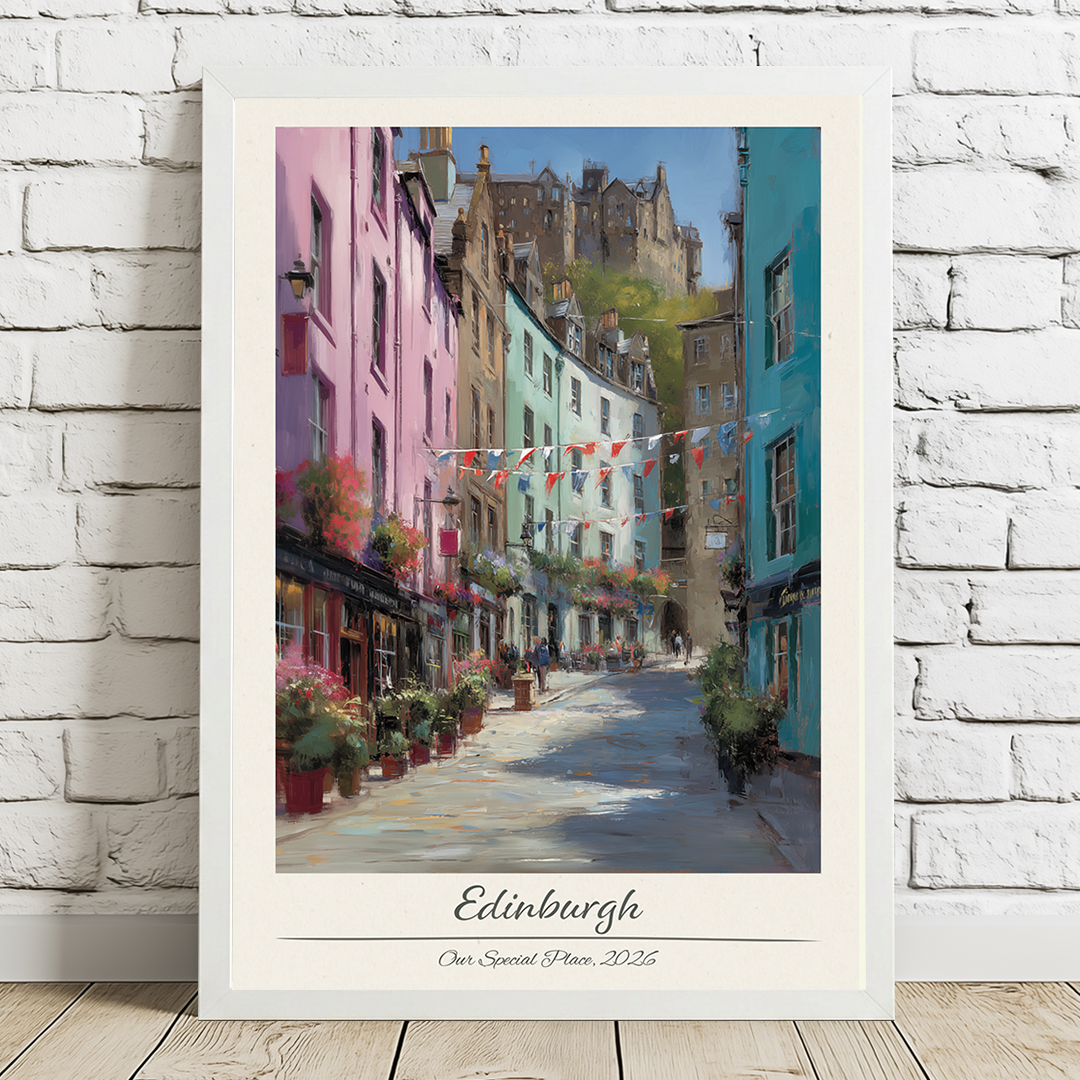 Framed artwork of a colorful street scene in Edinburgh with a castle in the background.