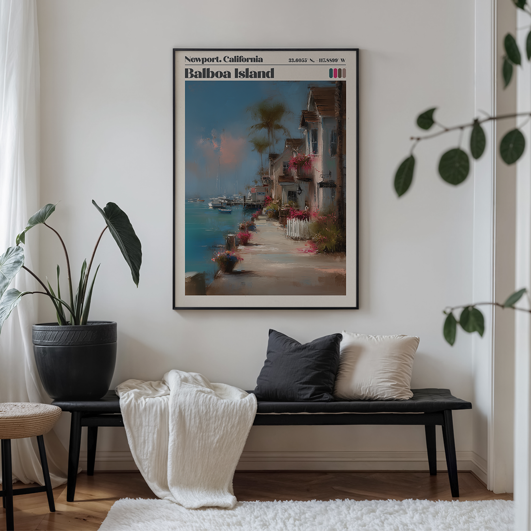 Framed artwork of Balboa Island in Newport, California above a bench in a living room.