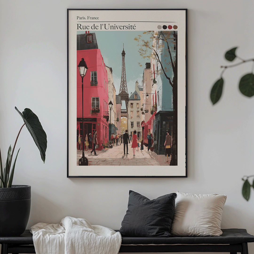 Framed artwork of a Paris street scene with the Eiffel Tower, hanging on a wall above a sofa.