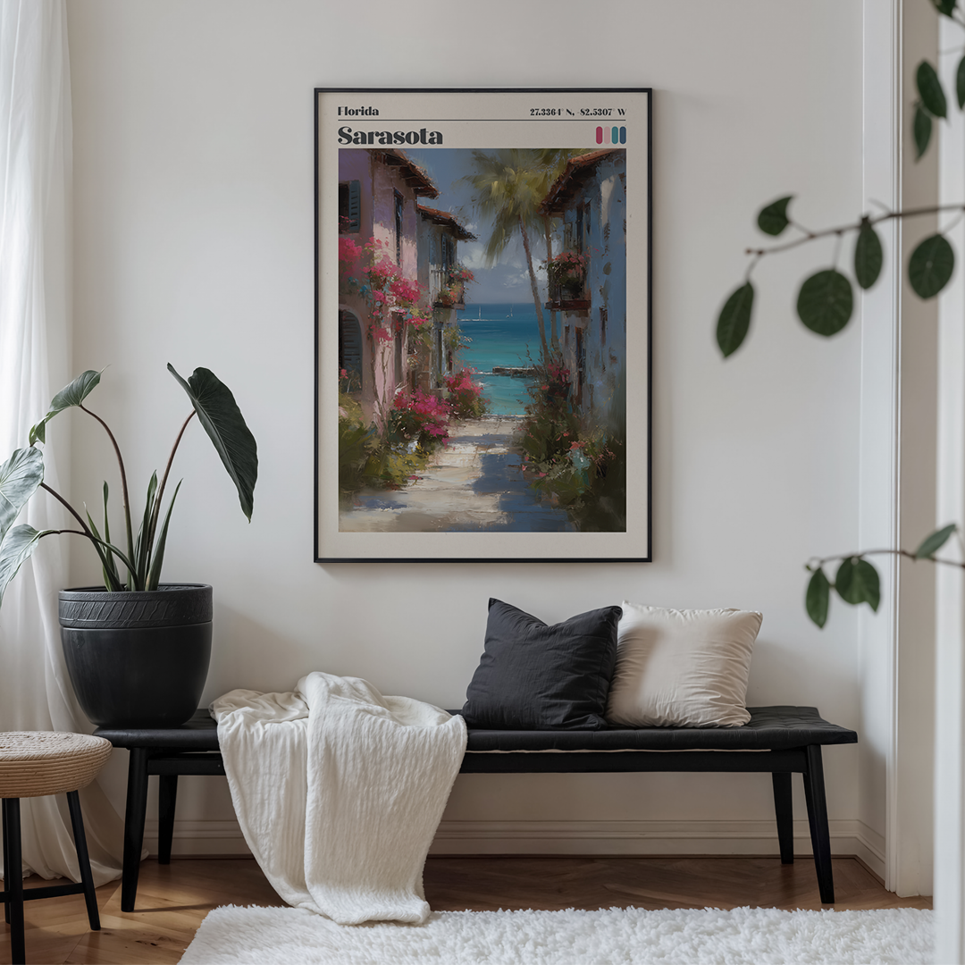 Living room with a bench, plant, and Sarasota Florida artwork on the wall.