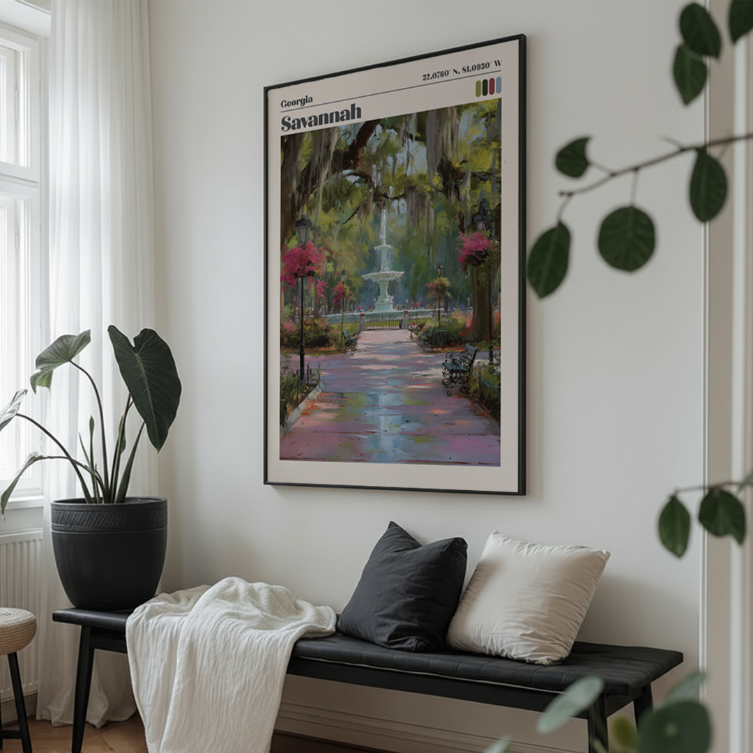 Framed artwork of a garden scene on a wall above a bench with cushions.
