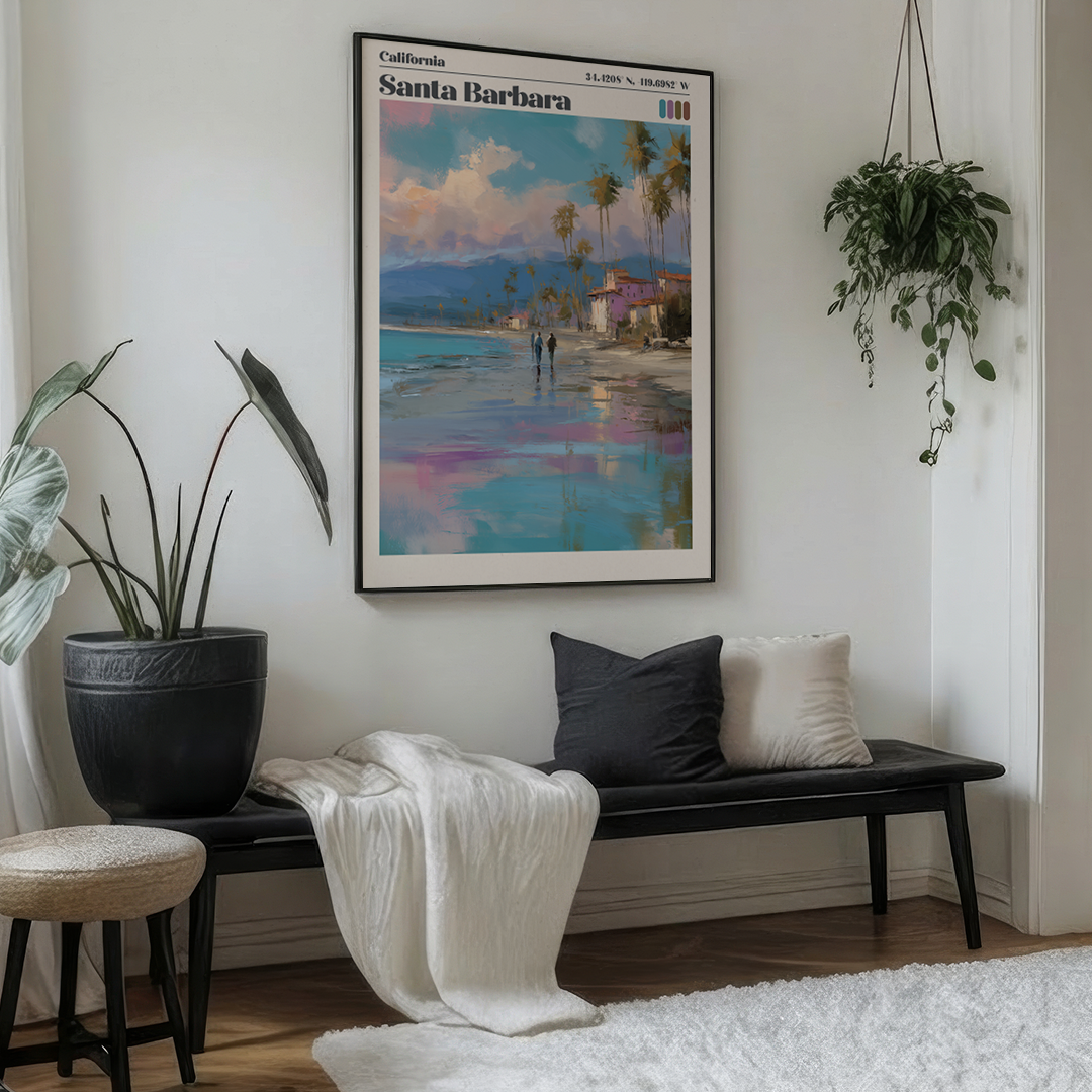 Living room with a bench, cushions, and a framed artwork of Santa Barbara on the wall.