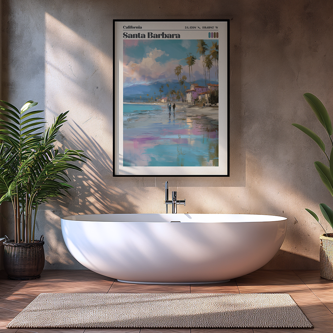 Modern bathroom with a freestanding bathtub, framed artwork of Santa Barbara, and plants.